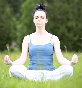 photo of girl meditating outside